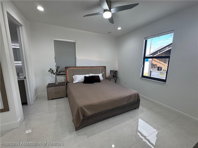 bedroom with light tile patterned floors, recessed lighting, baseboards, and ceiling fan