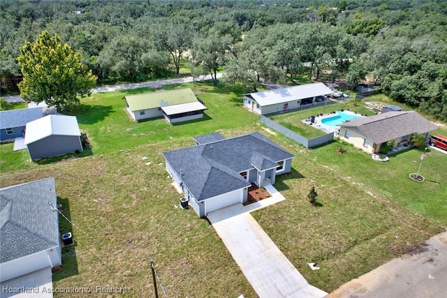2731 W Albatross Rd, Avon Park, FL 33825 - drone / aerial view of a forest and a pool