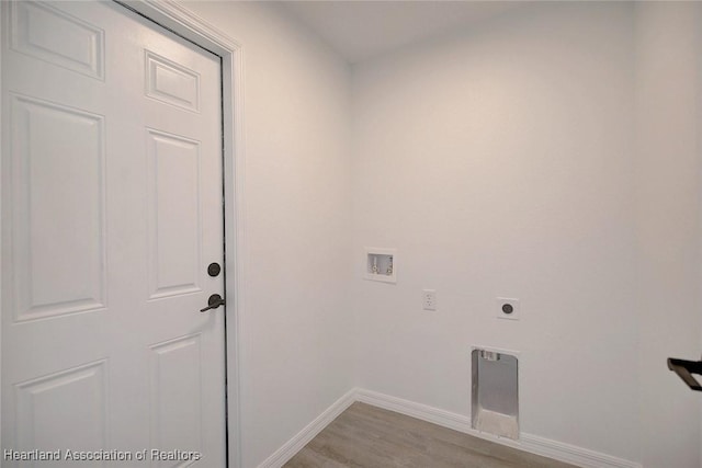 2731 W Albatross Rd, Avon Park, FL 33825 - washroom with hookup for a washing machine, hookup for an electric dryer, and light wood-type flooring