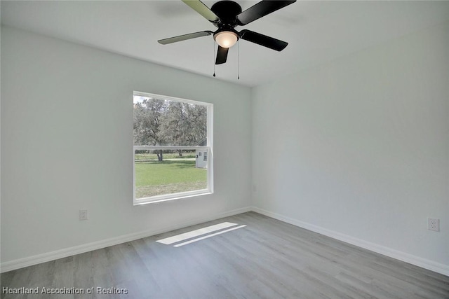 2731 W Albatross Rd, Avon Park, FL 33825 - spare room with wood finished floors and a ceiling fan