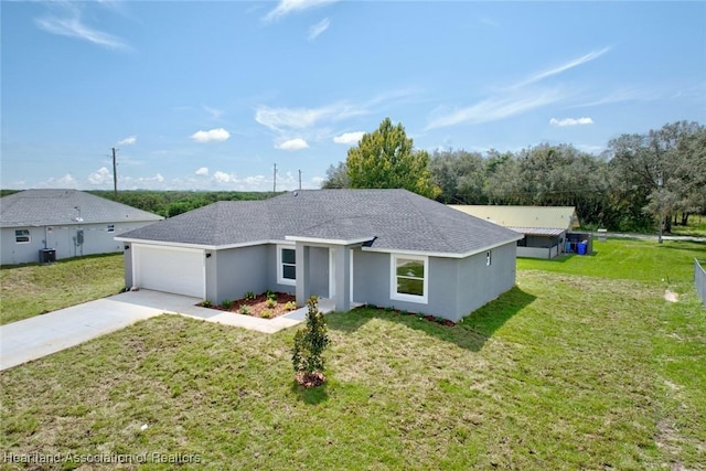 2731 W Albatross Rd, Avon Park, FL 33825 - single story home featuring a garage, driveway, roof with shingles, and a front yard