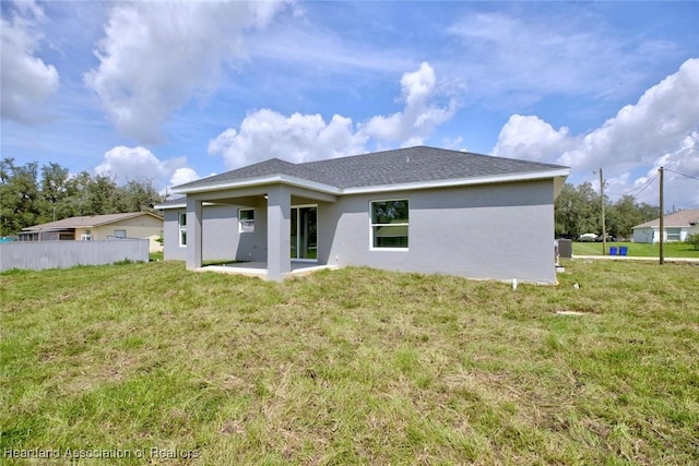 2731 W Albatross Rd, Avon Park, FL 33825 - back of property featuring stucco siding and a patio area