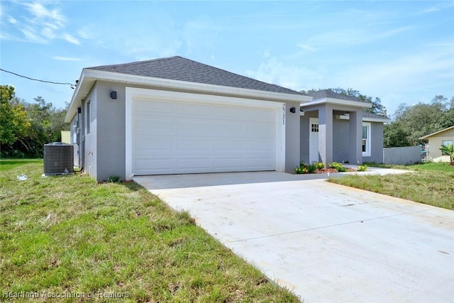 2731 W Albatross Rd, Avon Park, FL 33825 - view of front of property featuring stucco siding, driveway, a front lawn, and a garage
