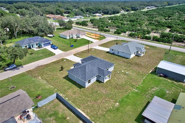 2731 W Albatross Rd, Avon Park, FL 33825 - aerial view of residential area with a heavily wooded area