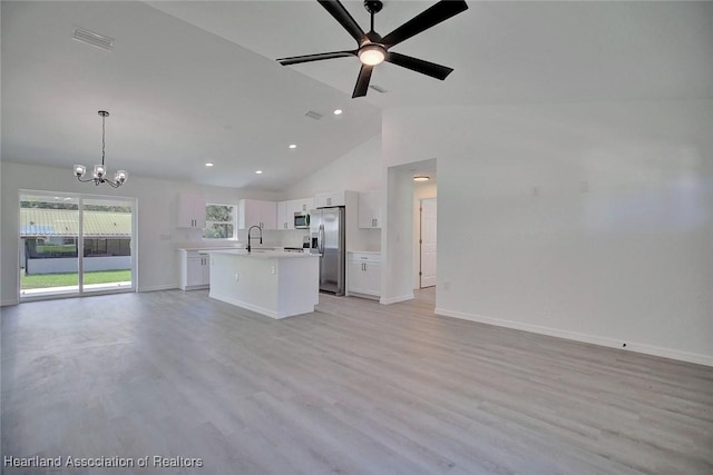 2731 W Albatross Rd, Avon Park, FL 33825 - unfurnished living room featuring a chandelier, ceiling fan, high vaulted ceiling, recessed lighting, and light wood-style flooring