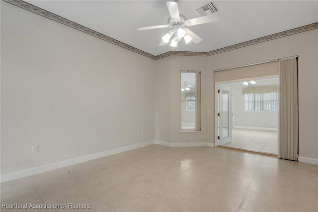 302 Ruby Ln, Winter Haven, FL 33884 - empty room featuring ceiling fan and light tile patterned flooring
