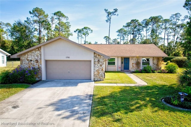 view of front of home with a garage, stone siding, concrete driveway, and a front yard