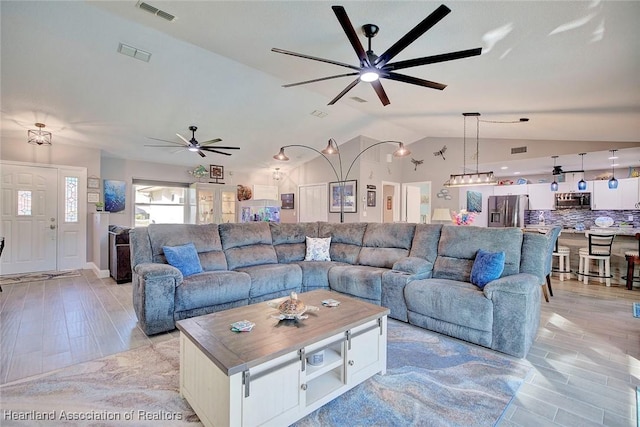 living room with lofted ceiling