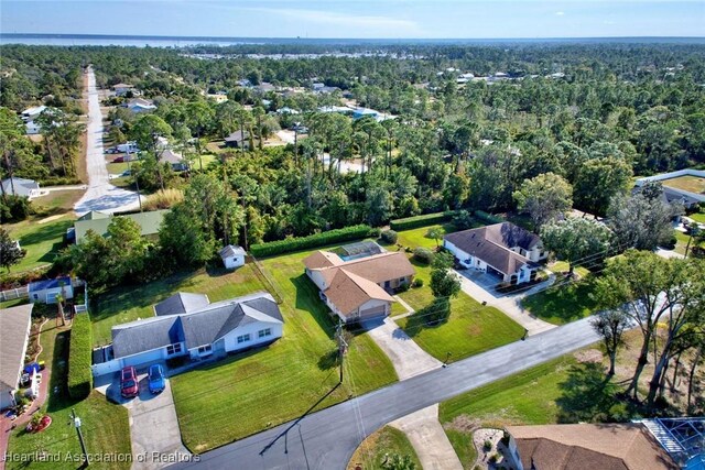 bird's eye view featuring a view of trees