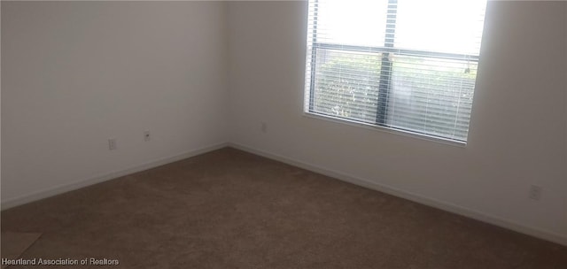 view of carpeted spare room