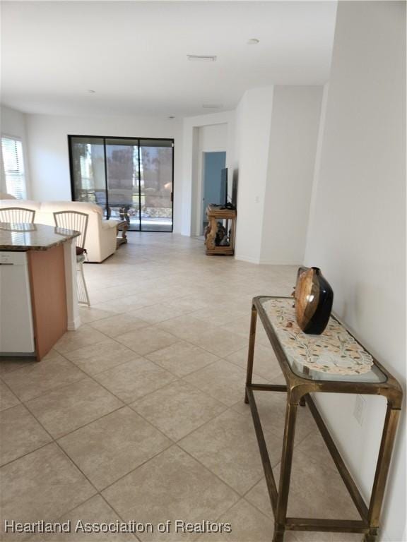 living room with light tile patterned floors