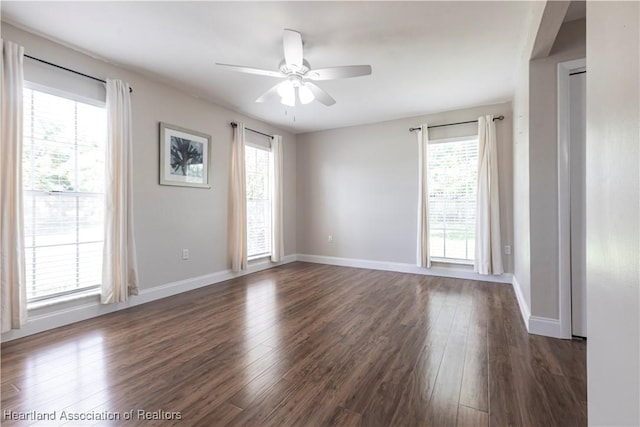1090 Knollwood Cir, Wauchula, FL 33873 - unfurnished room featuring a ceiling fan, plenty of natural light, and dark wood finished floors
