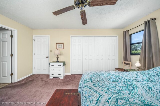 bedroom with a textured ceiling, a ceiling fan, baseboards, a closet, and carpet