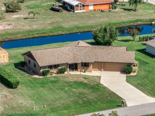 drone / aerial view featuring a water view