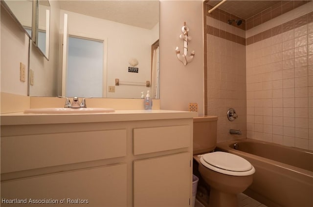 full bath featuring vanity,  shower combination, and toilet