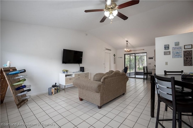 living room featuring baseboards, ceiling fan, vaulted ceiling, and light tile patterned flooring