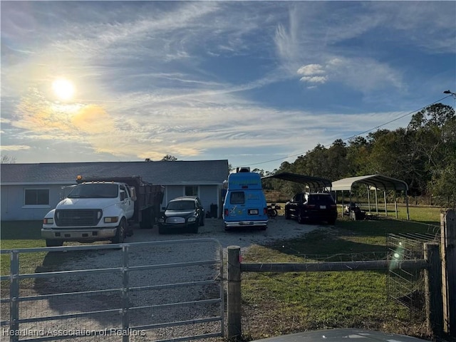 view of front of property with a carport