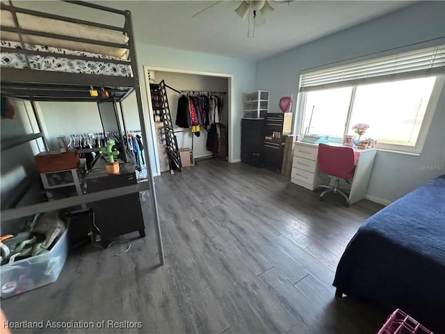 bedroom featuring hardwood / wood-style flooring and a closet