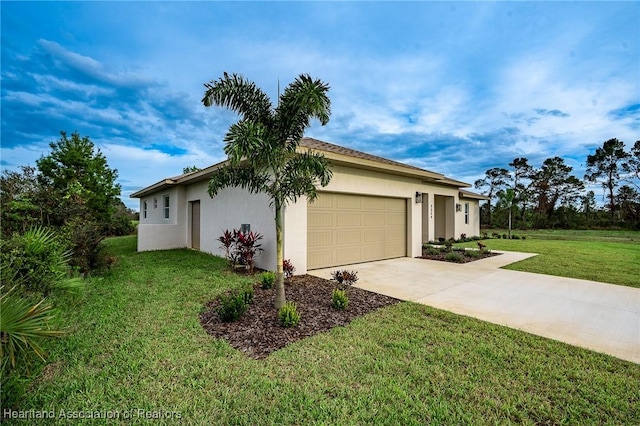 view of home's exterior featuring a garage and a yard