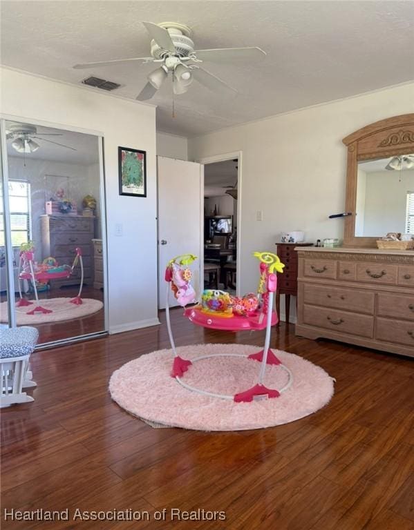 315 Sirena Dr, Lake Placid, FL 33852 - interior space with visible vents, ceiling fan, and dark wood-style flooring