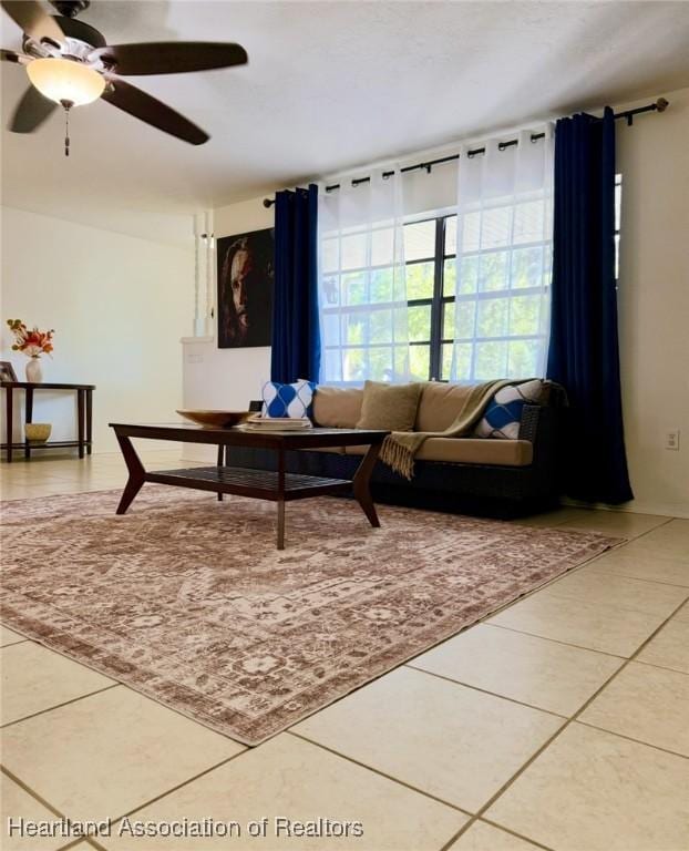 315 Sirena Dr, Lake Placid, FL 33852 - living room featuring tile patterned floors and a ceiling fan