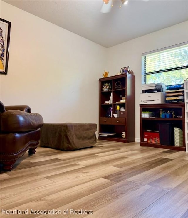 315 Sirena Dr, Lake Placid, FL 33852 - sitting room with a ceiling fan and wood finished floors