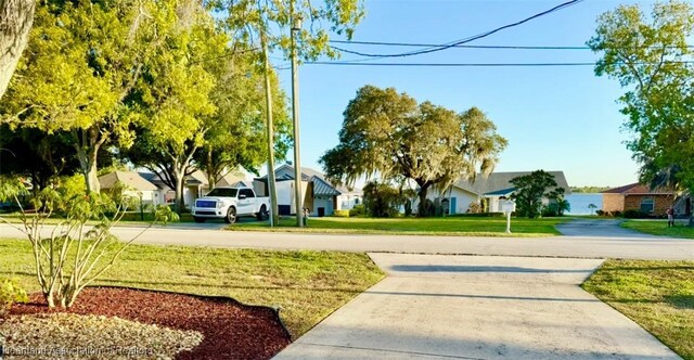 315 Sirena Dr, Lake Placid, FL 33852 - view of street with a residential view