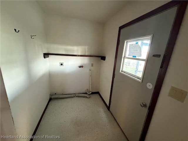 laundry room featuring laundry area, baseboards, washer hookup, and electric dryer hookup