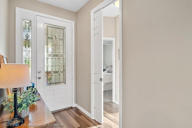 entryway with light hardwood / wood-style flooring