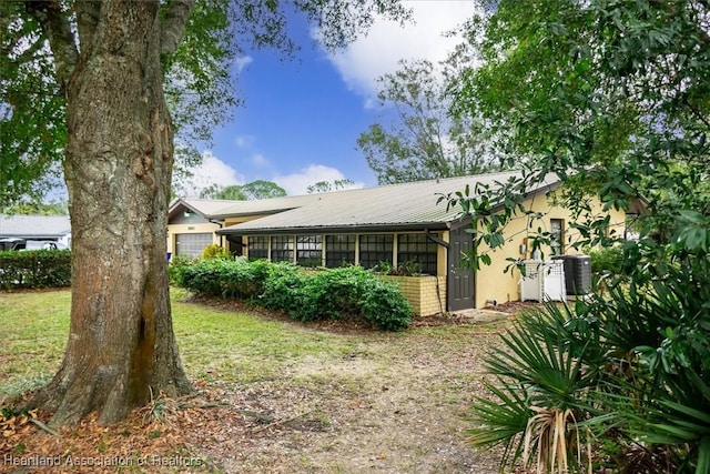 exterior space with a lawn