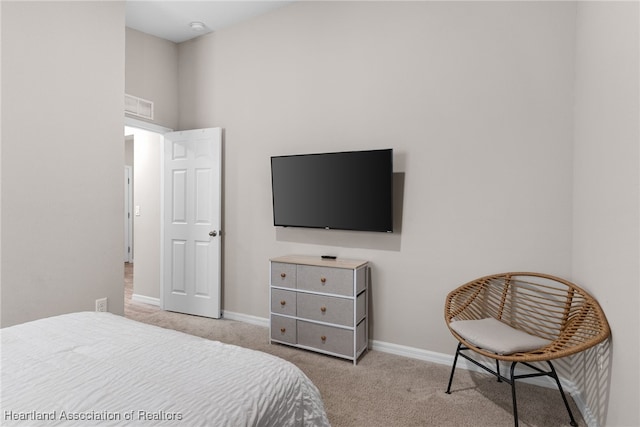 bedroom featuring carpet floors, baseboards, and visible vents