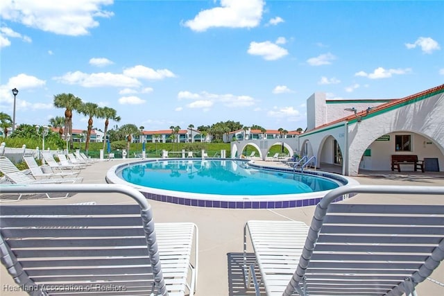 view of pool with a patio