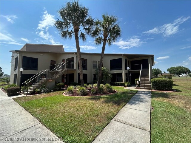 6000 Matanzas Dr, Sebring, FL 33872 - view of property featuring stairway