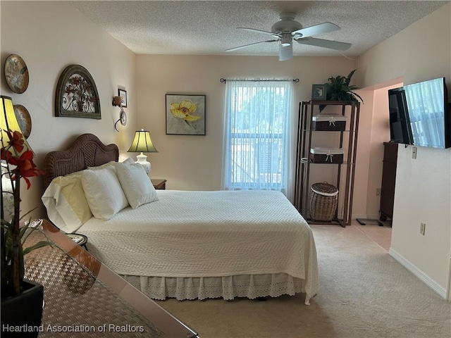 6000 Matanzas Dr, Sebring, FL 33872 - bedroom featuring light carpet, a textured ceiling, and ceiling fan