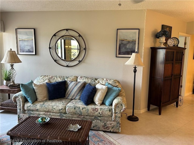 6000 Matanzas Dr, Sebring, FL 33872 - living room featuring a textured ceiling, light tile patterned floors, and baseboards