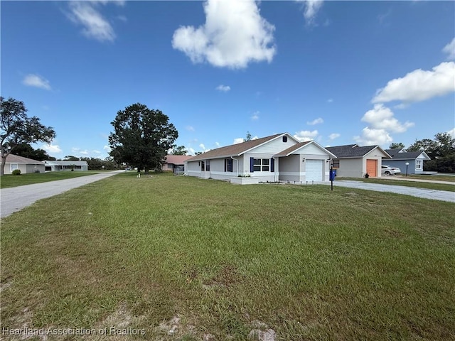 4329 Elson Ave, Sebring, FL 33875 - single story home with driveway, an attached garage, and a front lawn