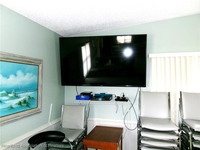 interior space featuring a textured ceiling