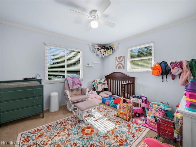 bedroom featuring ceiling fan, ornamental molding, and light carpet