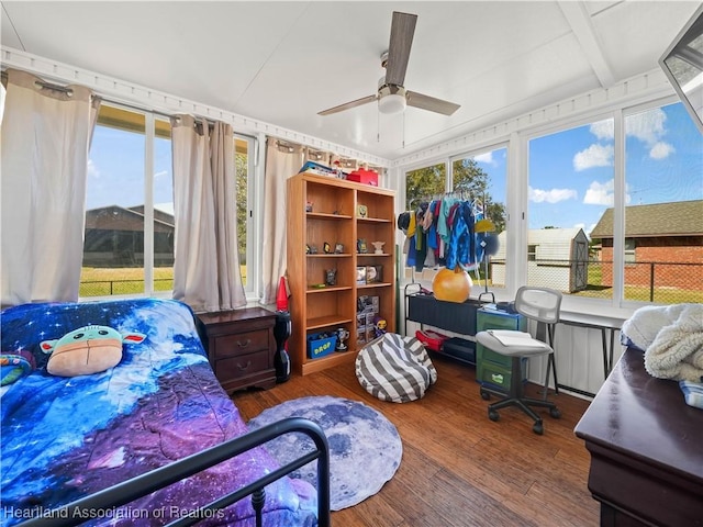 bedroom featuring hardwood / wood-style flooring and ceiling fan