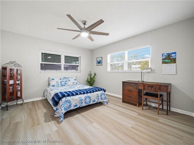 bedroom featuring ceiling fan and light hardwood / wood-style flooring