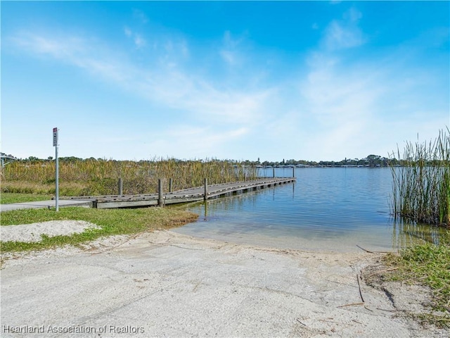 view of dock with a water view