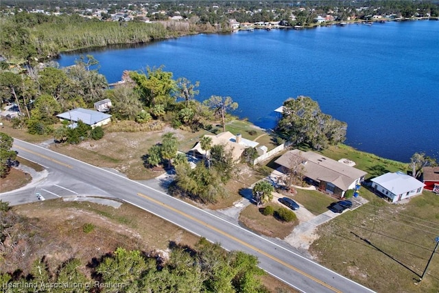 drone / aerial view with a water view