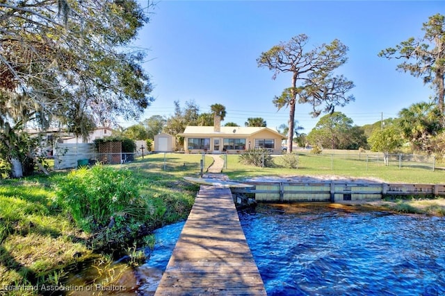 dock area with a lawn