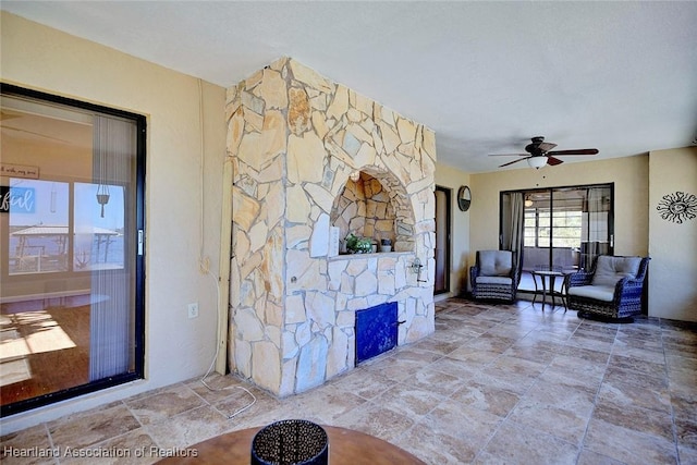 living room featuring ceiling fan