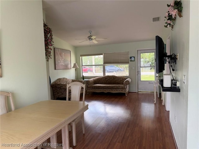 dining room featuring dark hardwood / wood-style floors and ceiling fan