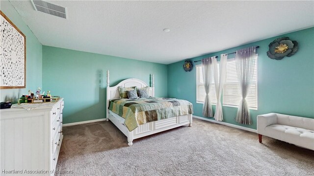 1076 Sugarwood St, Davenport, FL 33837 - carpeted bedroom with baseboards