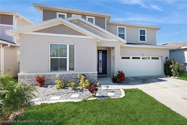 1076 Sugarwood St, Davenport, FL 33837 - view of front of house with concrete driveway, an attached garage, stucco siding, stone siding, and a front lawn