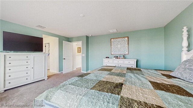 1076 Sugarwood St, Davenport, FL 33837 - carpeted bedroom featuring baseboards