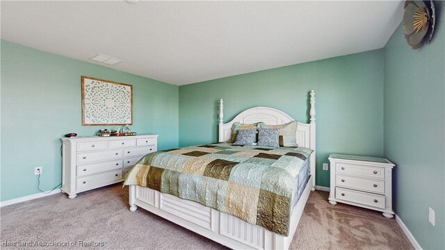 1076 Sugarwood St, Davenport, FL 33837 - carpeted bedroom with baseboards