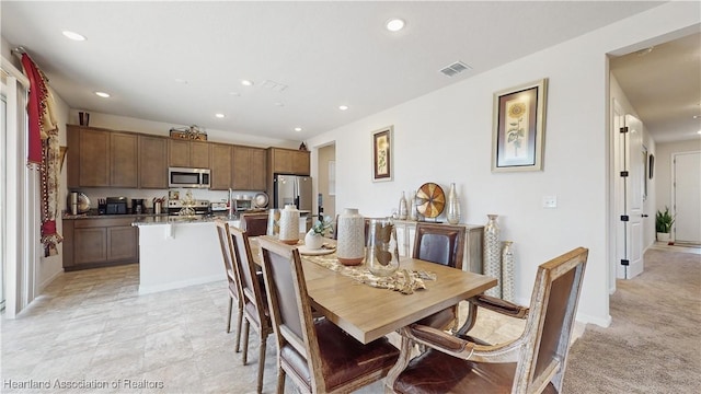 1076 Sugarwood St, Davenport, FL 33837 - dining area with recessed lighting and baseboards